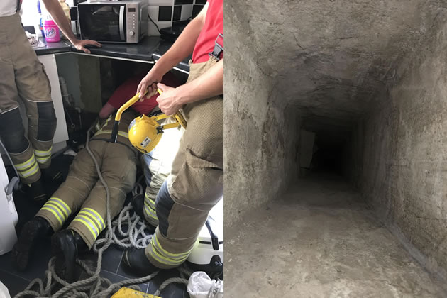 Firefighters discover the hidden chimney shown on right