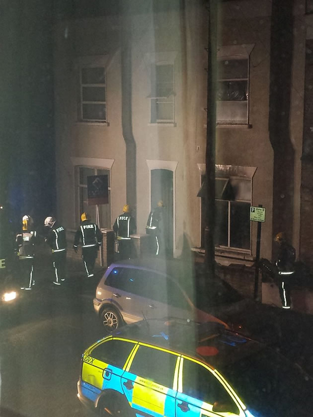 Fire fighters at the scene of the blaze in Vale Grove, Acton 