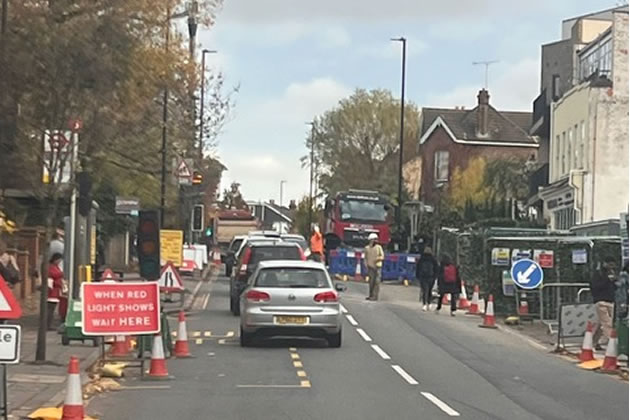 The temporary road layout is described as unsafe and confusing