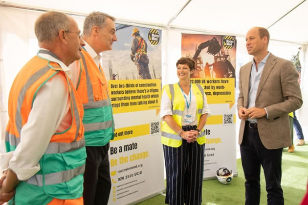 The Prince chats to workers at the site