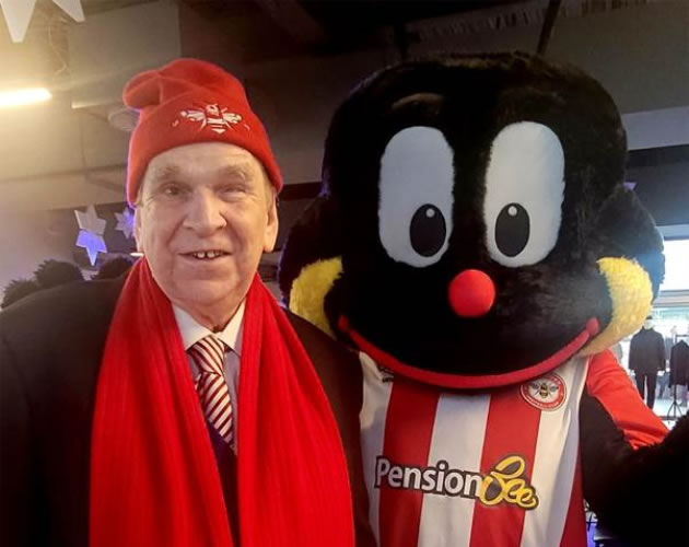 Mell Collins with Brentford mascot