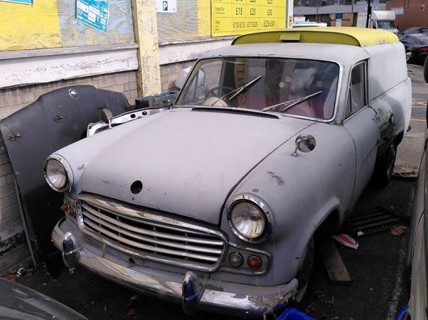 Front of old van at car wash