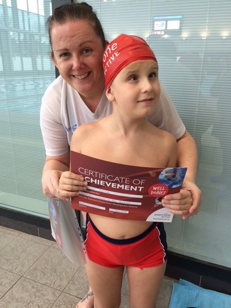 Oliver and teacher at  Northolt pool