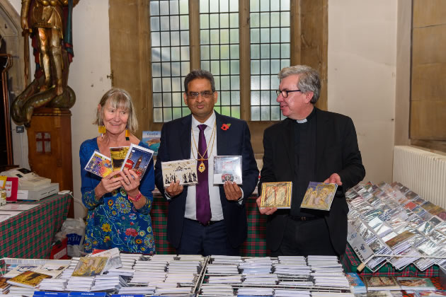 (l-r) Sue Green, founder Ealing Charity Christmas Card Shop; Ealing’s Immediate Past Mayor, Councillor Munir Ahmed; and Father Richard Collins, Vicar of Parish Church of Christ the Saviour.