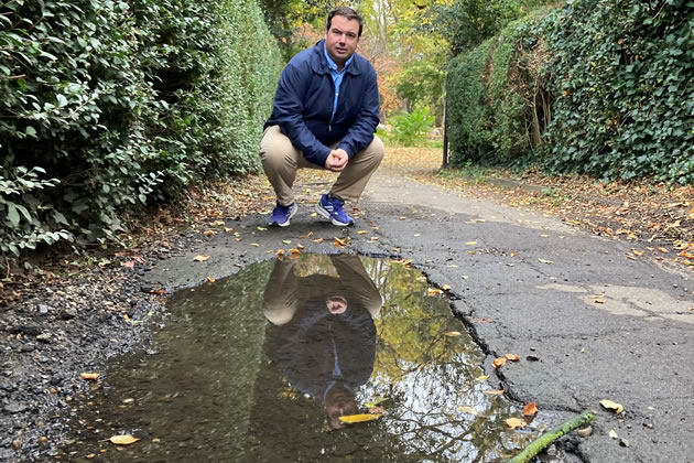 Matt Mellor by the flooded footpath by Elers Road 