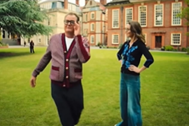 Alan Carr and Susie Dent on the lawn in front of Pitzhanger Manor.