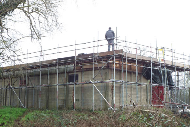 The scaffolding is enabling the roof repair to be ciompleted more quickly 