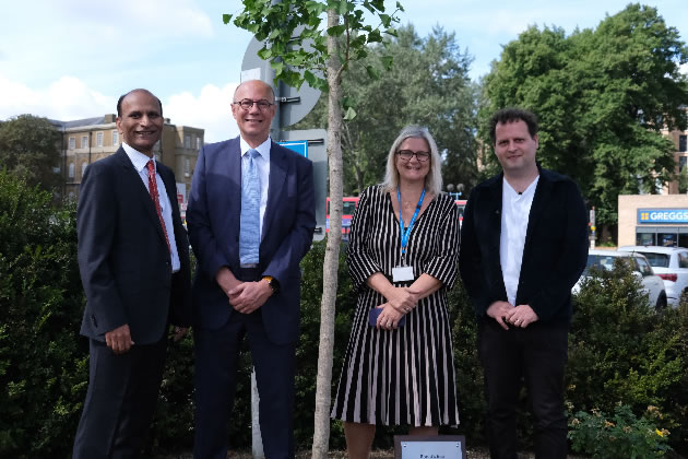 Adam Kay (right) attended ceremony to plant the tree 