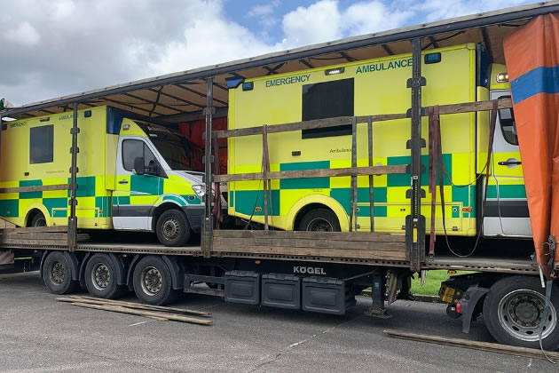 Ambulances from the UK being transported to Ukraine