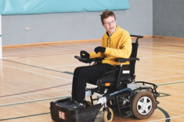 Barney in training for Powerchair football 