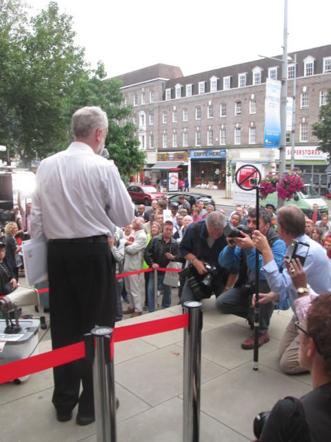 Large numbers congregate outside the Town Hall