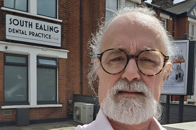 Alastair Mitton outside the South Ealing Dental Practice
