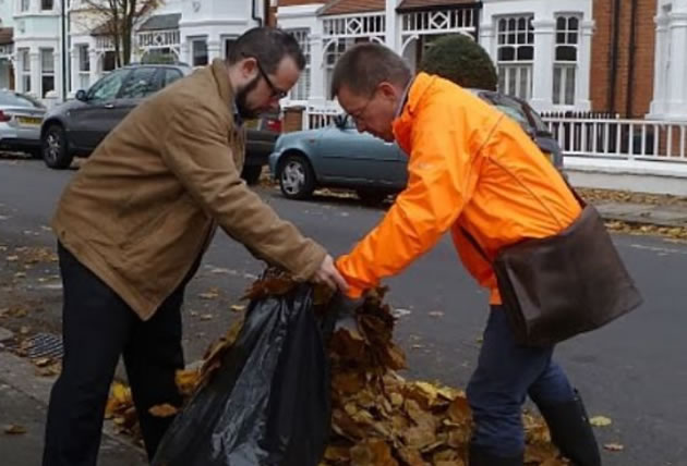gary malcolm and andrew steed clean up leaves