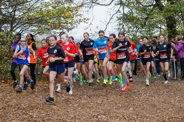 Competitors in the London Youth Games running through Hampstead Heath 